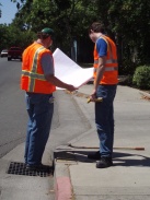 2 GIS engineers looking at a map